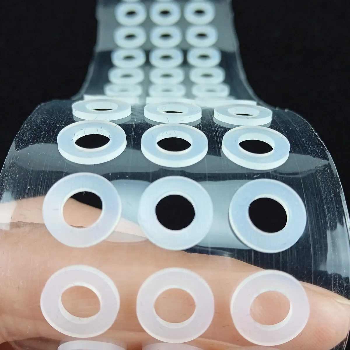 Textured silicone pad for equipment interface